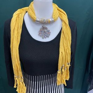 NEW yellow scarf with decorative silver peacock pendant